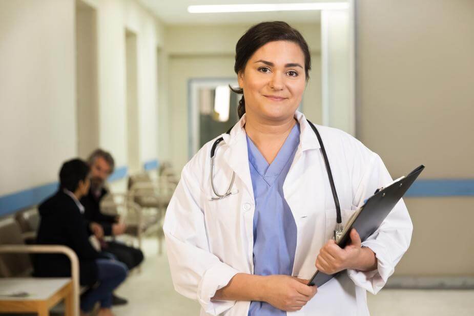 female doctor with clipboard